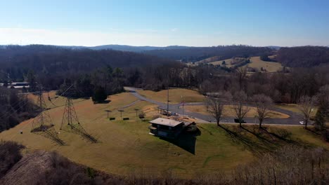 aerial reveal of melton hill dam in oakridge, tennessee