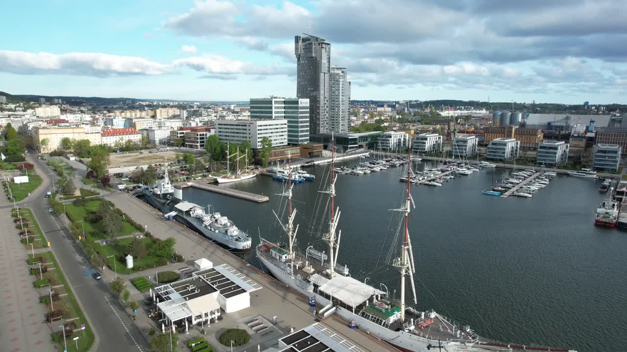 Gdynia city marina, with ships and yachts. Modern Polish urban coastline