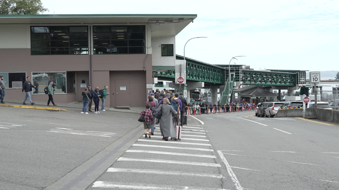 People Waiting in Line at a Ferry Terminal
