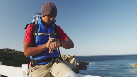 sporty mixed race man with prosthetic leg enjoy his hike