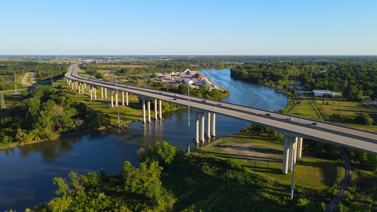 Zilwaukee Bridge over blue river in Michigan, aerial view