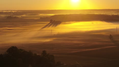 Drone-aerial-view-of-foggy-autumn-morning,-Kaunas-county,-Lithuania