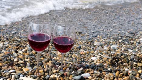 wine glasses on the beach