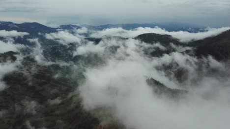 aerial view morning mist fog over los angeles neighborhood over clouds showing mountains in the di aerial view morning mist fog over los angeles neighborhood over clouds showing mountains in the distance