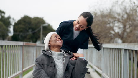 Caregiver,-old-woman-and-nurse-in-park