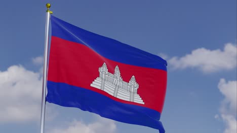 Bandera-De-Camboya-Moviéndose-En-El-Viento-Con-Un-Cielo-Azul-Claro-En-El-Fondo,-Nubes-Moviéndose-Lentamente,-Asta-De-Bandera,-Cámara-Lenta