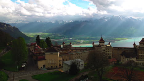 caux palace in switzerland, aerial overlooking the geneva lake, valley and alps