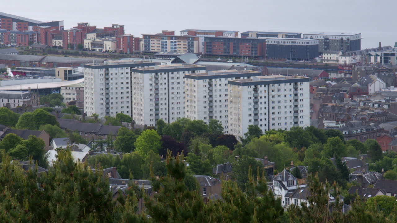Long shot of concrete high rise blocks of flats in Dundee. Dallfield Court, Hilltown Court, Tulloch Court, Bonnethill court