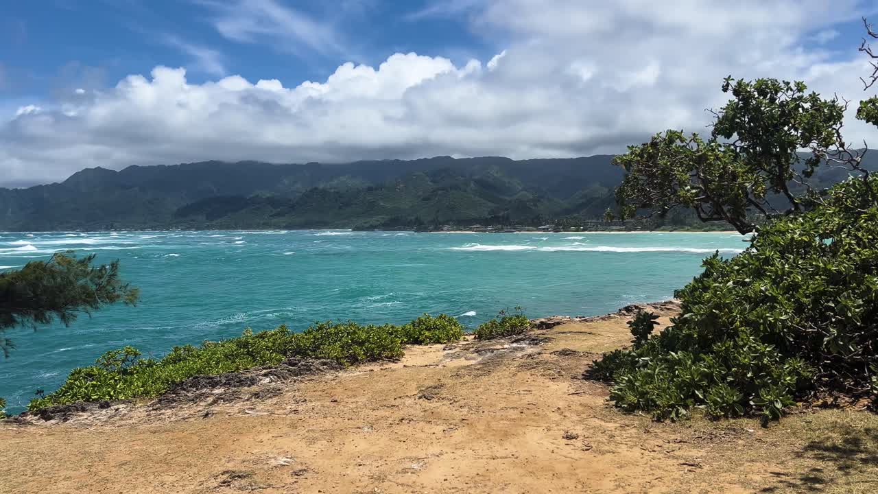 Stunning coastal view on Oahu's west coast with clear skies and calm ocean