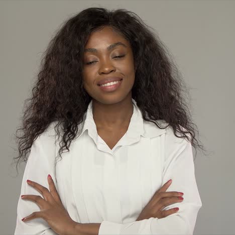 Friendly-businesswoman-smiling-for-camera