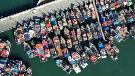 Aerial-Dolly-Over-Packed-Marina-With-Fishing-Boats