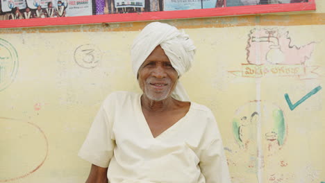 portraits of an elderly man in traditional indian attire