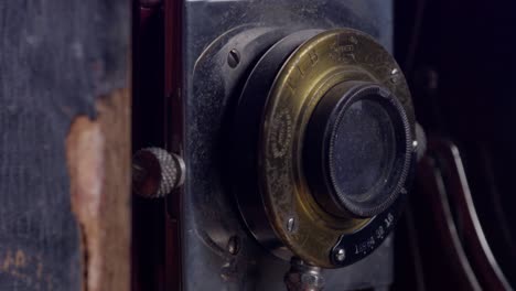 Conley-brand-antique-photo-camera-with-close-up-shot-of-lens-from-the-side