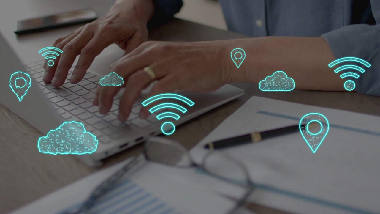 Man typing laptop WiFi icon appearing and causing cloud and map pins showing network over keys
