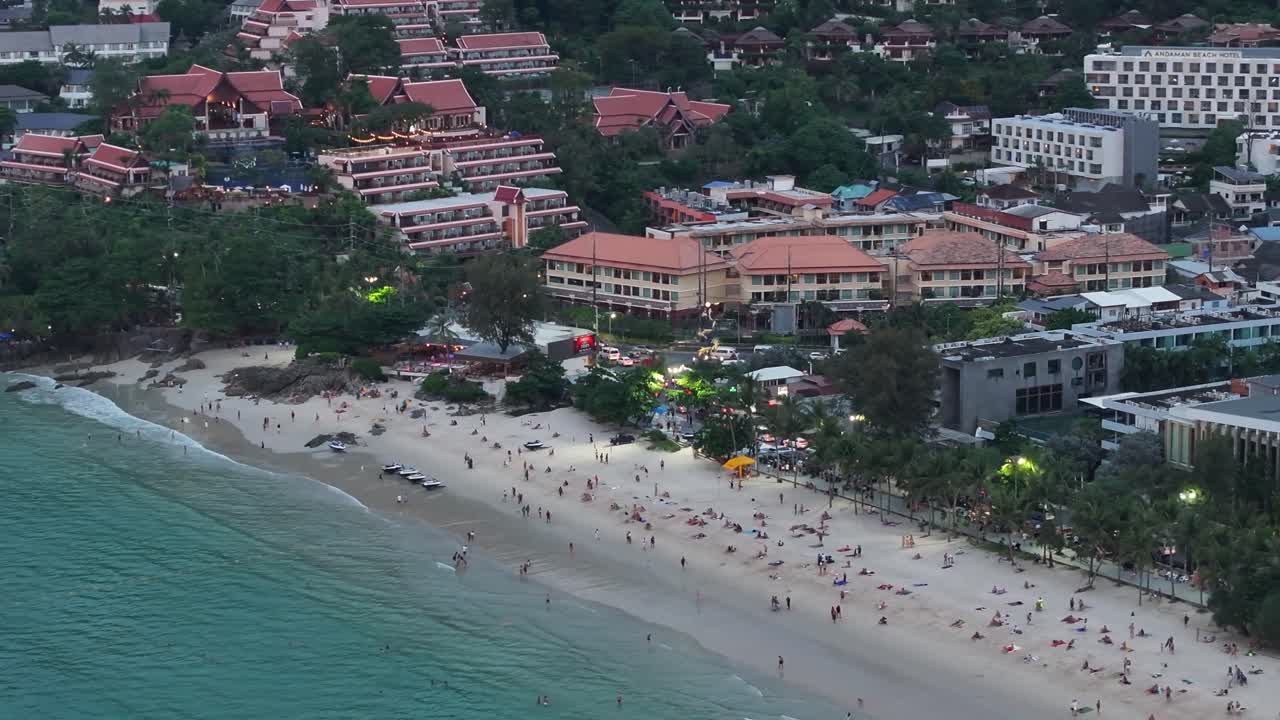 People On The Sandy Shores Of Pa Tong Beach Resort Town In Phuket Island, Thailand. Aerial Drone Shot
