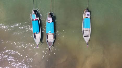 Top-down-aerial-view-of-longtail-boats,-Ao-Nang,-Krabi,-Thailand