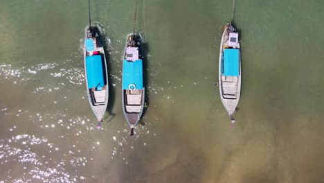 top down aerial view of longtail boats, ao nang, krabi, thailand