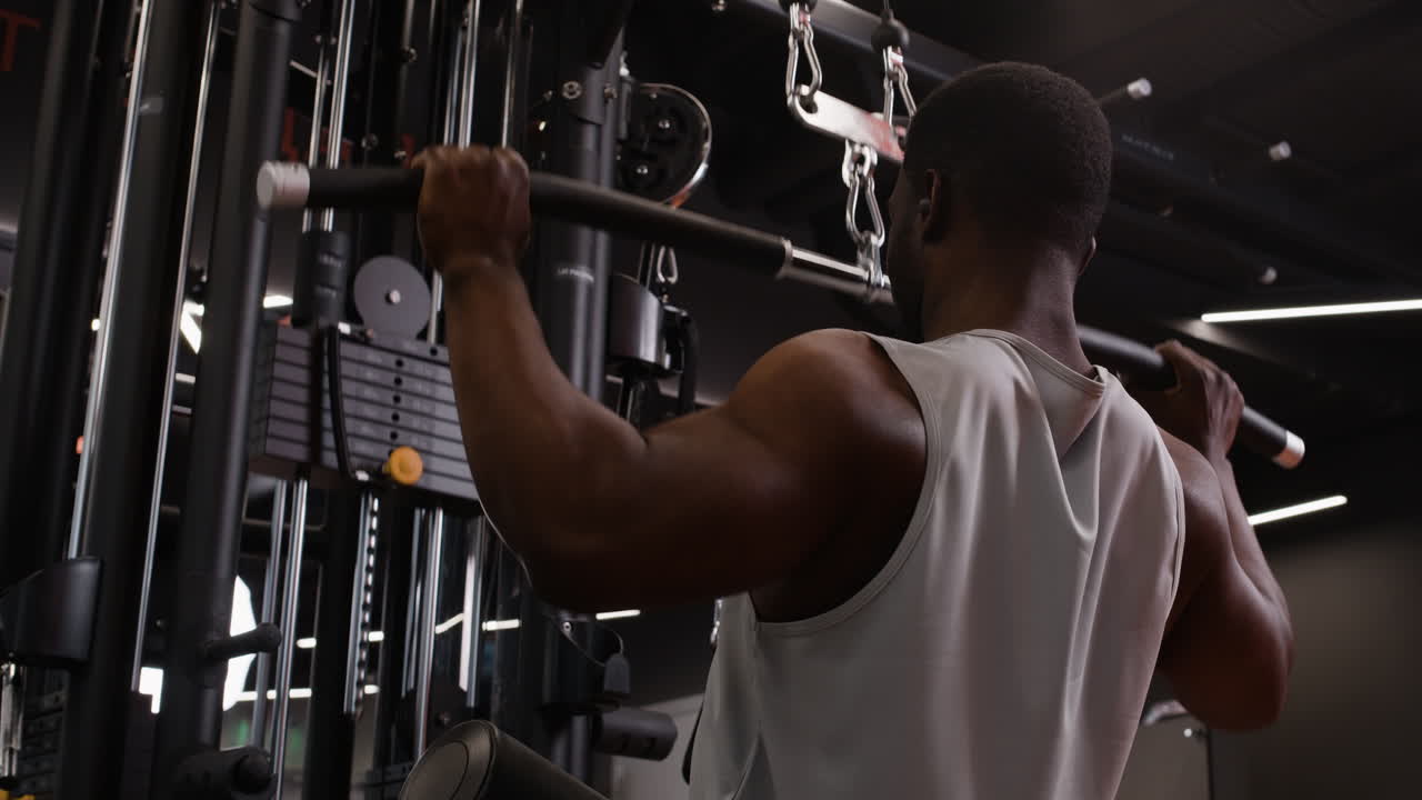 Man Working Out on a Gym Machine