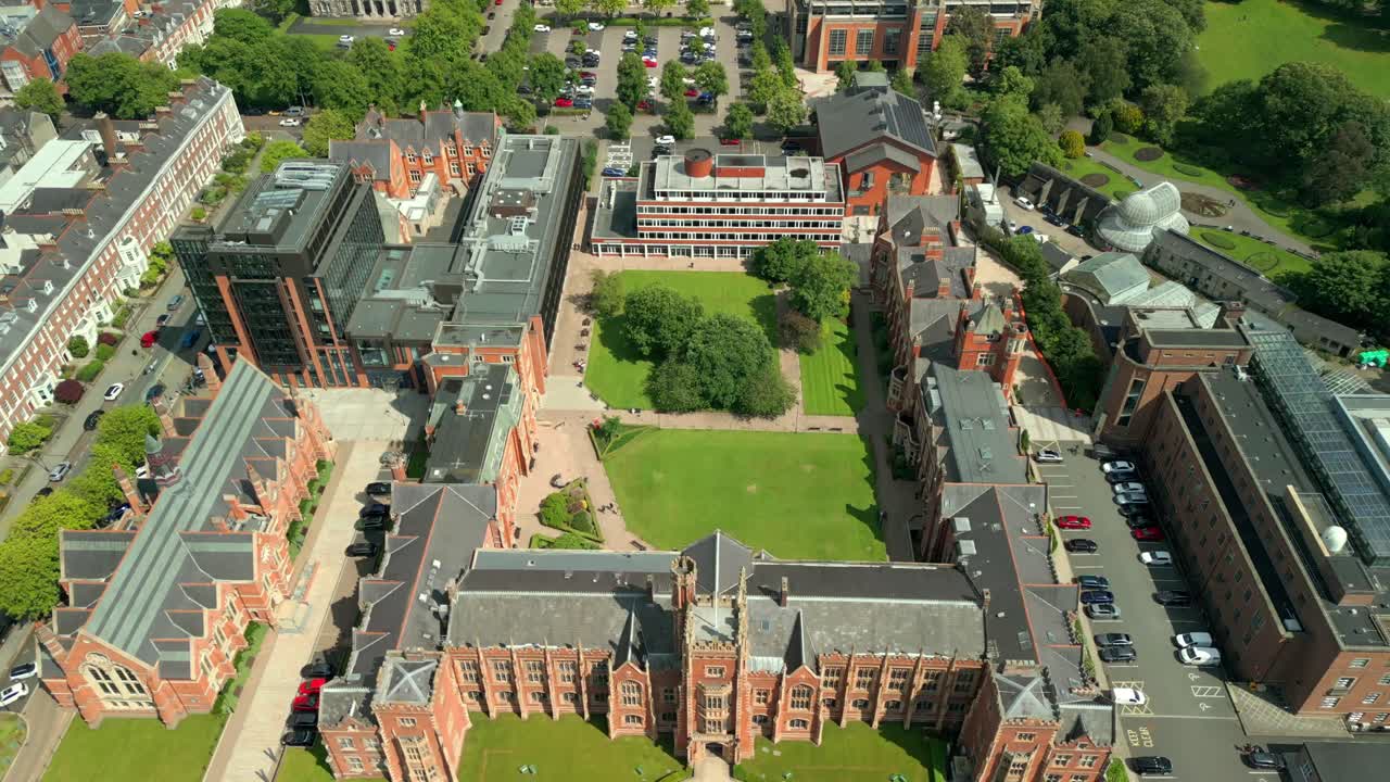Front-on, advancing aerial video of Queen's University Belfast, in Northern Ireland, UK on a bright and sunny day. Produced at 4K resolution, 60FPS and with Rec709 color.