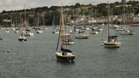 Hand-held-shot-of-small-fishing-boats-rocking-back-and-forth-in-Truro-Harbour