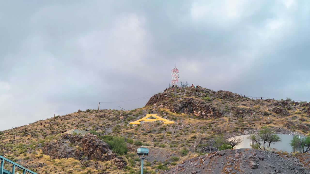 Time lapse of people hiking up A-Mountain in Tempe, Arizona.