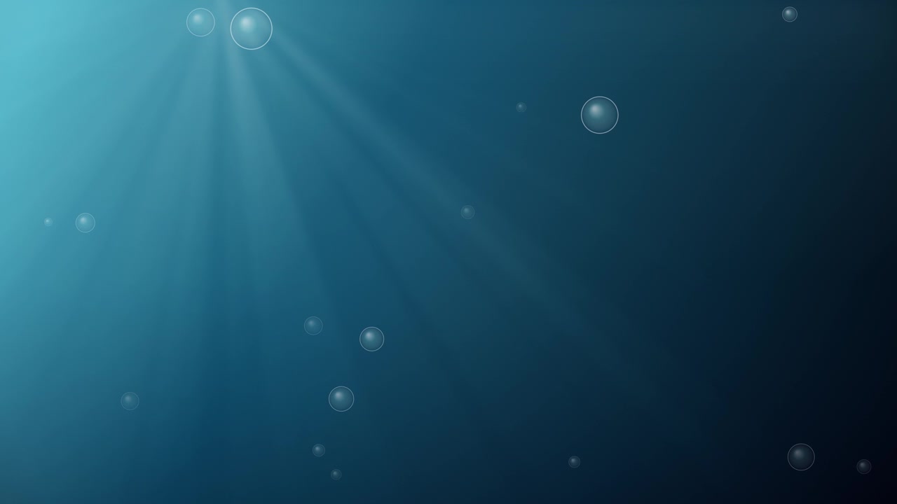 Sunbeams pierce deep blue water while small air bubbles drift upward in calm motion