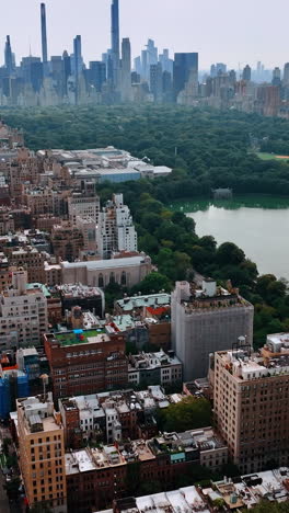 panorama of new york city near the beautiful central park. skyline with skyscrapers at backdrop. vertical video