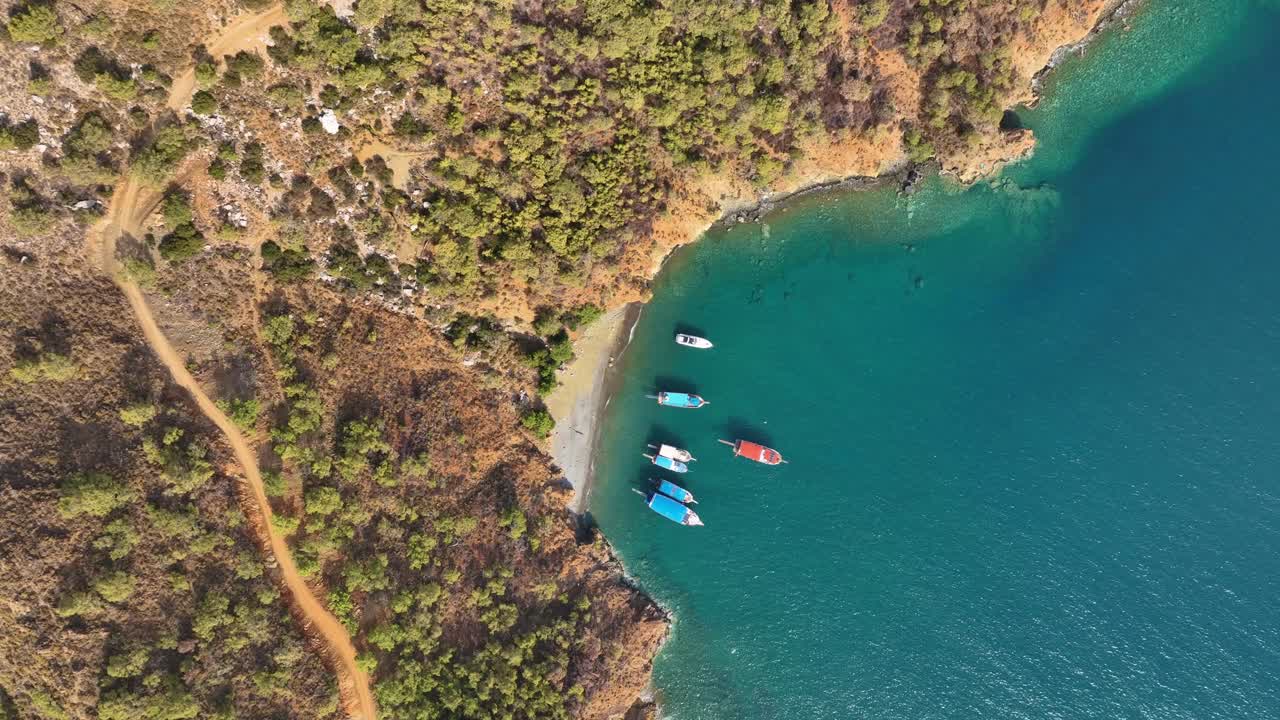 Aerial view of a secluded bay with boats