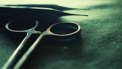 Surgical medical instruments layout revealed in slide shot CLOSE-UP