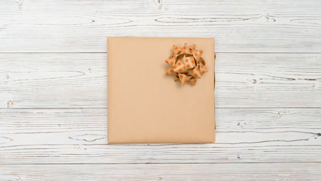 christmas gifts changing on wooden background