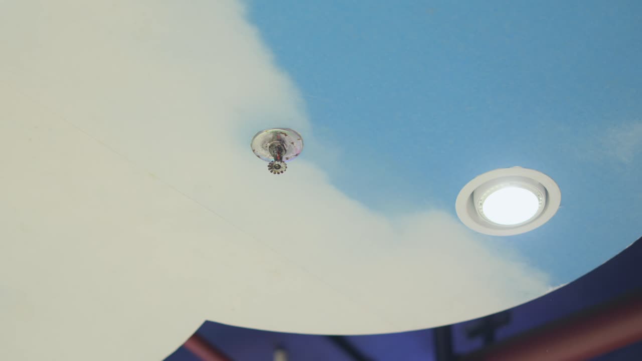 smoke detector on building roof closeup view