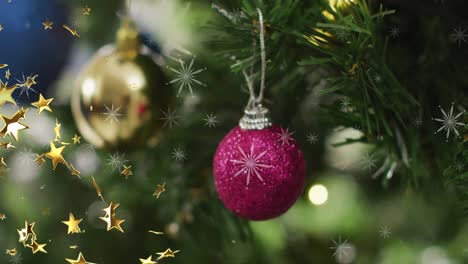 Animation-of-stars-falling-over-christmas-tree-with-baubles