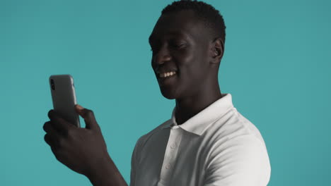 african american man on blue background.