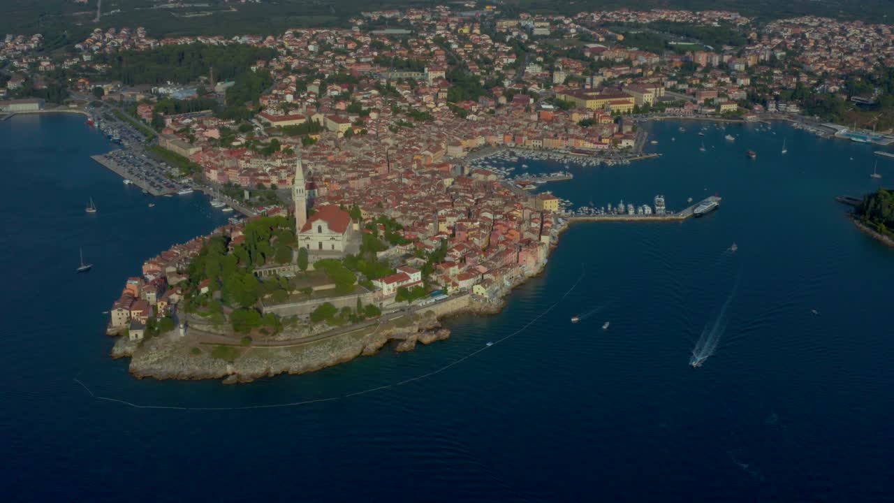 Pull out aerial shot revealing the whole, historic and beautiful town of Rovinj, Croatia