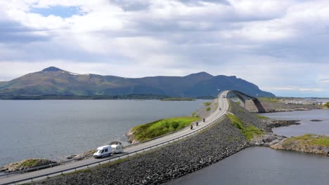 atlantic ocean road two bikers on motorcycles.