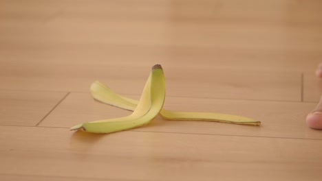 banana peel on wooden floor