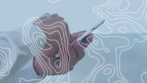 animation of moving contour lines, over businessman using smartphone