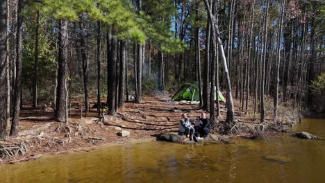 a picturesque campsite unfolds by a quiet lake capturing moments of family relaxation a picturesque campsite unfolds by a quiet lake capturing moments of family relaxation and the scenic beauty of nature