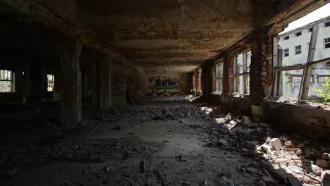 Destruction-and-debris-in-crumbling-halls,-abandoned-scary-place---urban-exploration