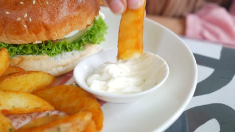 detail shot of french fries on table