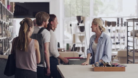 customers at a pottery studio