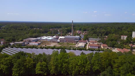 wonderful aerial top view flight solar field plant factory at village chlum, czech republic summer 2023