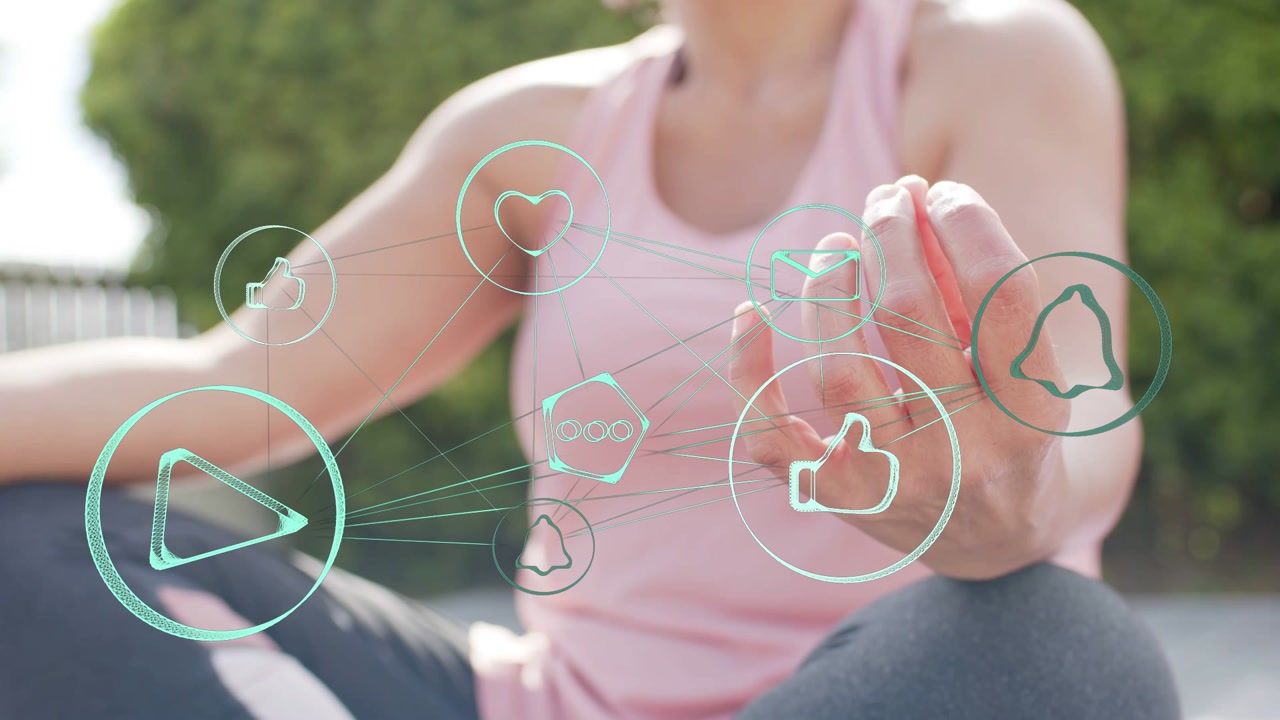 Mature woman moving right hand and animating play, thumbs-up, bell icons, forming wellness focus