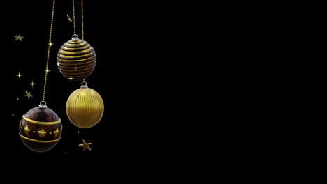 black and gold christmas baubles swinging with gold stars on black background, copy space