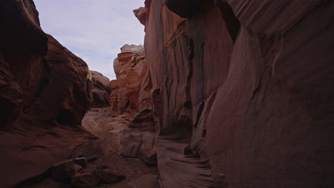 gimbal shot moving down slot canyon