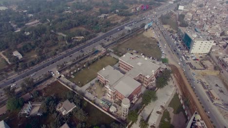 Bombay,-India,-Triangular-Aerial-view-of-roads,-traffic-is-going-on,-old-houses-top-view