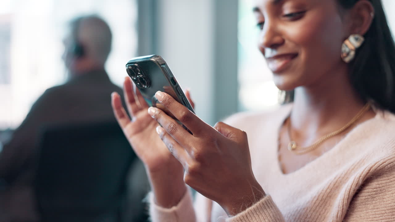 Woman smiling using a mobile phone