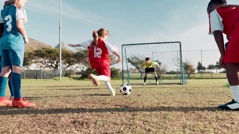 kids playing soccer on a field