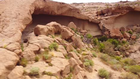 Establisher-drone-aerial-sideways-shot-of-Arco-de-Taja-natural-arch,-Tenerife