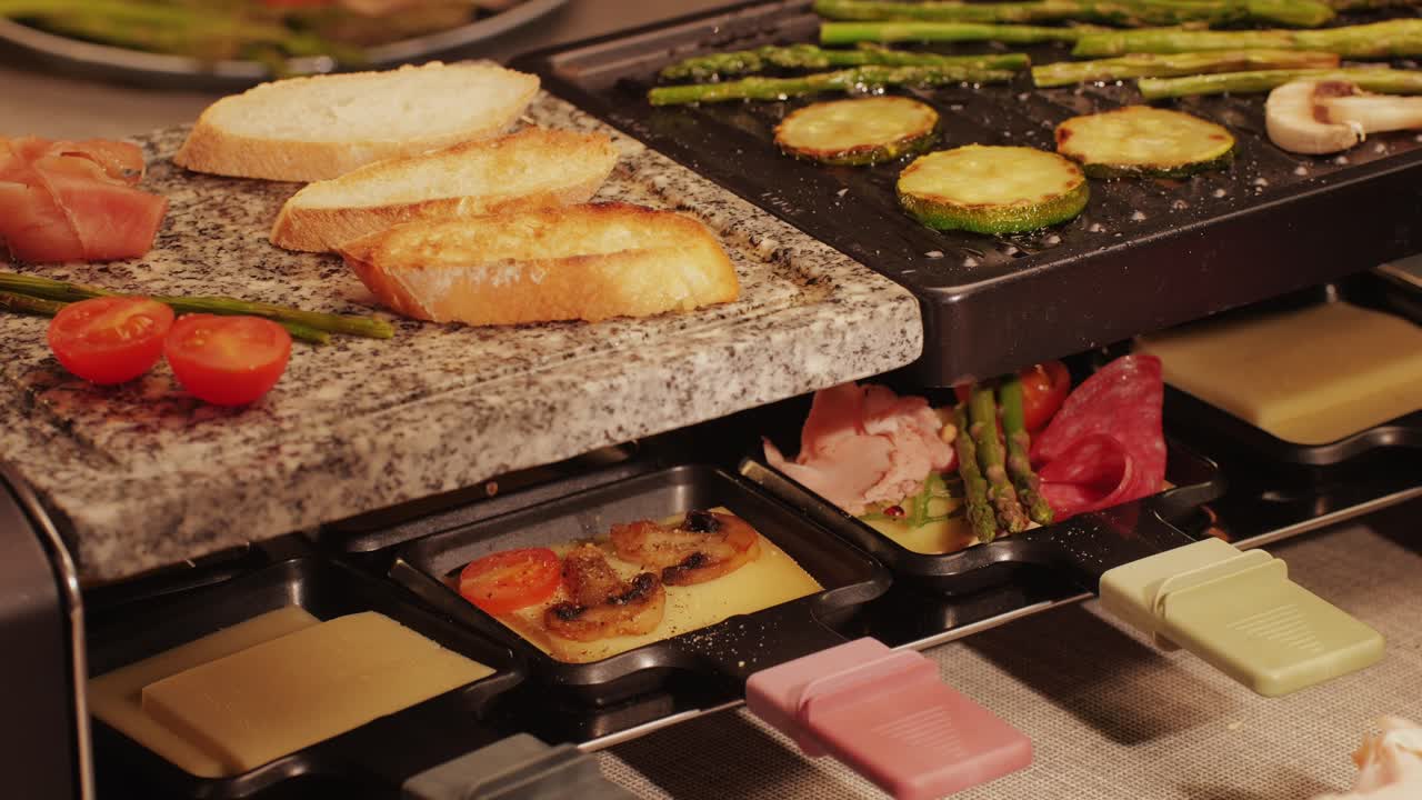 French Swiss or Spanish restaurant with traditional tapas food, Spanish cuisine, delicious tapas and cheese plate, bruschetta with cheese, olives dry tomatoes and tasty sandwich bar appetizer, buffet